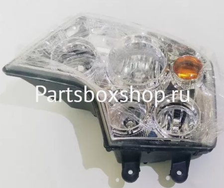Фара в сборе левая HOWO A7 WG9925720001
